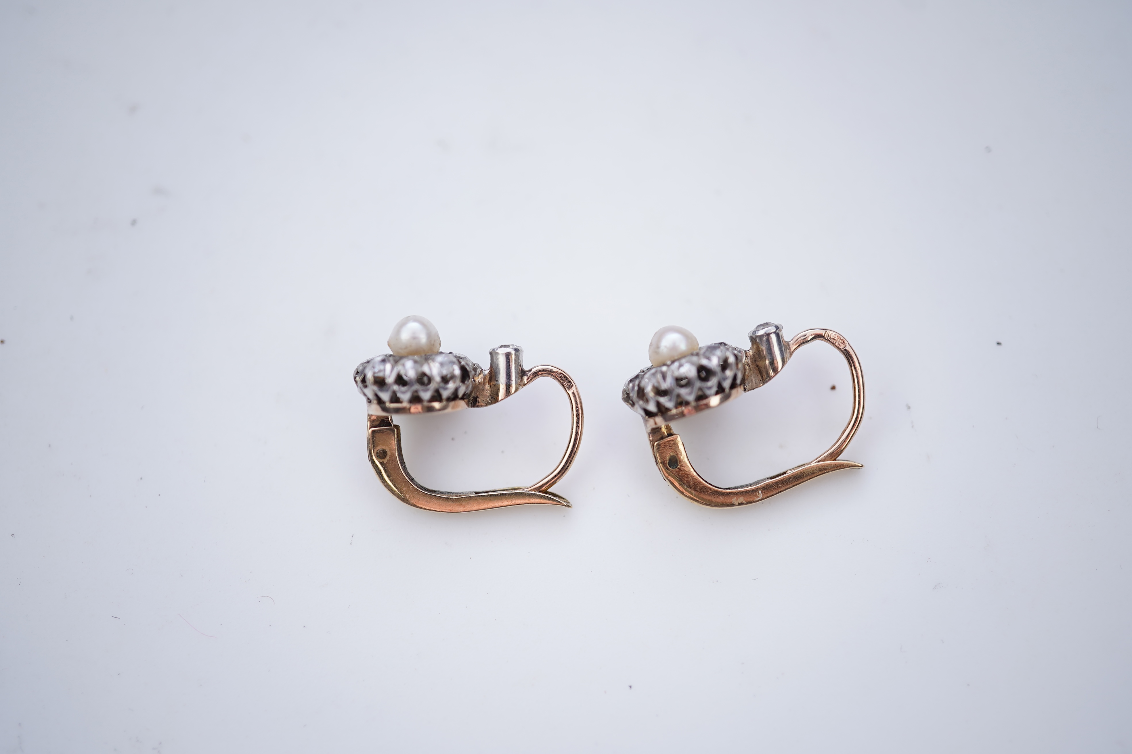 A pair of pearl and diamond earrings, early 20th century